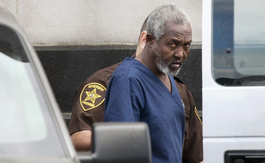 Mohammad Saaili Shibin, a Somali man accused of acting as chief negotiator for pirates who killed four American hostages, is transported from the U.S. District Court in Norfolk, Va., after a hearing on April 13, 2011.