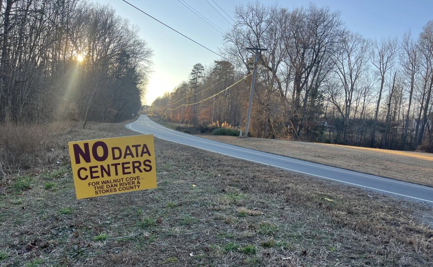 Several signs opposing a data center project have appeared throughout Walnut Cove in North Carolina.