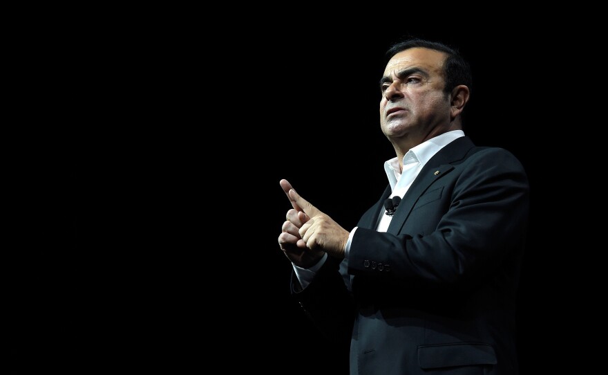 Carlos Ghosn, then Nissan's chairman and CEO, delivers a speech in Las Vegas in January 2017. Ghosn was widely celebrated for reviving Nissan after the company neared bankruptcy in 1999. Now he's been removed from leadership at the company after an internal investigation found financial misconduct.
