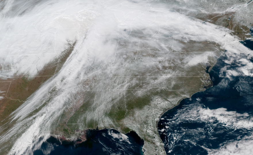 A massive spring storm is bringing blizzard conditions to several central U.S. states, leading officials to close hundreds of schools and hundreds of miles of roads.