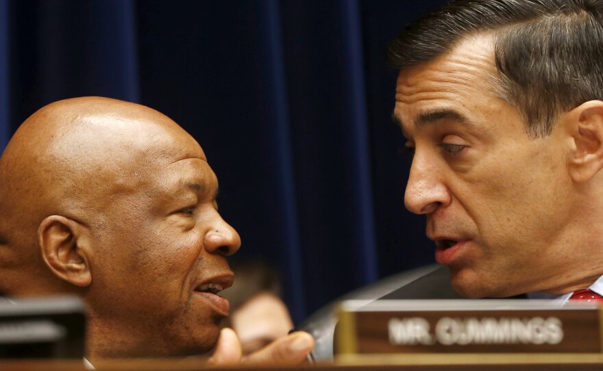 House Oversight and Government Reform Committee Chairman Darrell Issa (right) speaks with the committee's ranking Democrat, Elijah Cummings, last week, during a hearing on IRS conference spending.