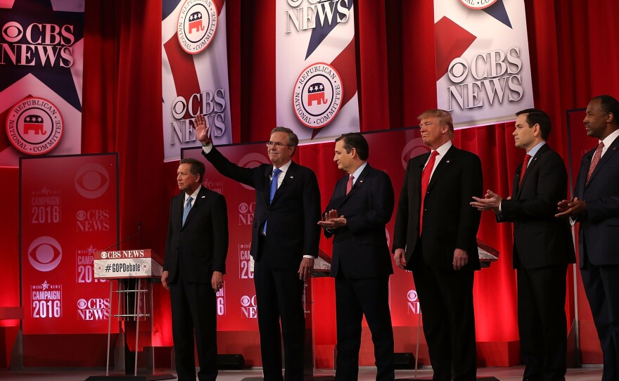 Republican presidential candidates Donald Trump and Ted Cruz argue during the CBS News Republican Presidential Debate in Greenville, South Carolina on Saturday.