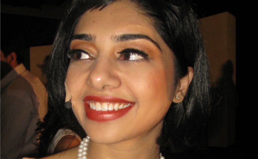 Kiran Chaudhry, 33, says the deeper the divide over culture and identity grows, the more the Oxford-educated entrepreneur and performer feels the need to remain in Pakistan. Here she is seen still in costume after a rehearsal of the musical <em>Mamma Mia!</em>.