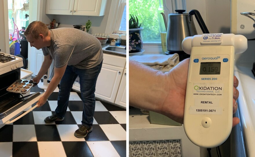 Environmental epidemiologist Josiah Kephart studies pollution from cooking. In this 2021 photo he measured nitrogen dioxide levels from cooking in his kitchen. At right: A nitrogen dioxide air monitor shows 0.159 parts per million, or 159 parts per billion. That's above the World Health Organization hourly guideline of 106 ppb. Kephart has since replaced the gas stove with an electric one.
