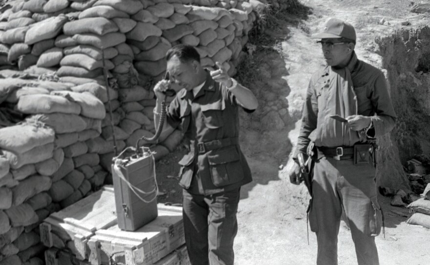 Laotian Gen. Vang Pao, seen here calling in air strikes against suspected Communist positions from the Long Cheng Command Post in January 1972, led an army of Hmong tribesmen to fight against Communist insurgents backed by the North Vietnamese. A CIA-led effort that started in 1961 tried to help him in that fight.