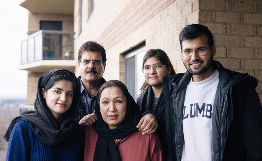 Kamila Noori, a prominent Afghan judge, on the balcony of the apartment where she will live with her husband and two of their daughters.