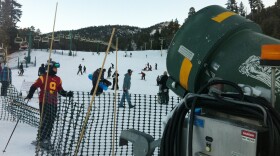 Snow enthusiasts ski down Bear Mountain at Big Bear Resorts thanks to powerful snow-making machines that have kept the slopes open during California's extreme drought, December 30, 2013.