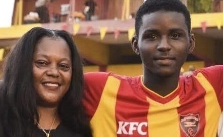 "I don't see anything wrong with being a mama's boy," says Shaquan Reid, a soccer star and accounting major at Chicago State. The 21-year-old is pictured with his mom, Jenese Anglin.