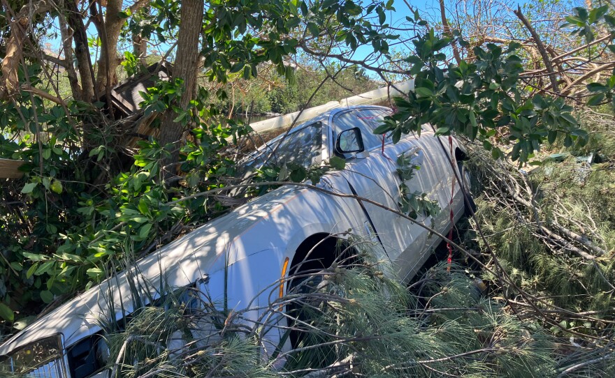 A Rolls Royce swept into the mangroves in Bonita Springs, south of Cape Coral, on Sept. 30, 2022.