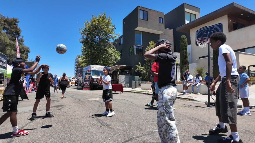Kids play basketball at the Juneteenth Block Party hosted by Louisiana Purchase and Black San Diego in North Park on June 19, 2026.