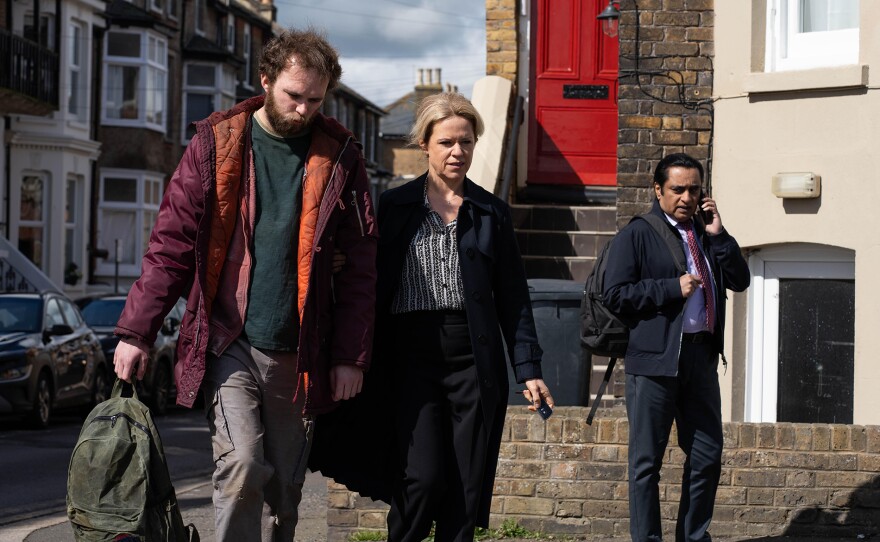 Shown L-R: Marty Baines (Maximilian Fairley), DCI Jess James (Sinéad Keenan), DI Sunny Khan (Sanjeev Bhaskar) MASTERPIECE: UNFORGOTTEN, Season 6, Episode 3. The team discover Gerry’s nationalist views, his connections to the suspects, and his violent streak. Jess reaches out to her sister, as Leanne and Sunny’s friendship evolves.  Shown L-R: Marty Baines (Maximilian Fairley), DCI Jess James (Sinéad Keenan), DI Sunny Khan (Sanjeev Bhaskar)  
