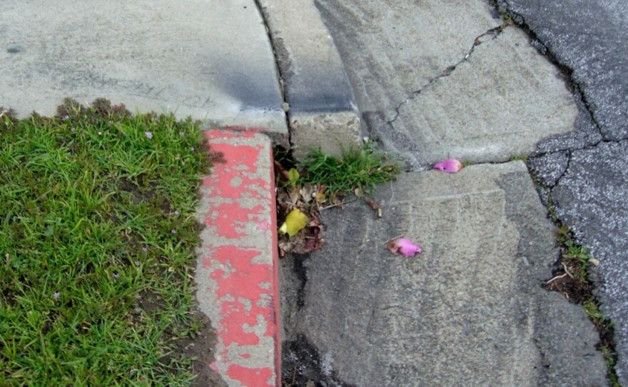 The curb in Hayward, shown in March 2006, has changed over the years. For decades it moved about 4 millimeters per year.