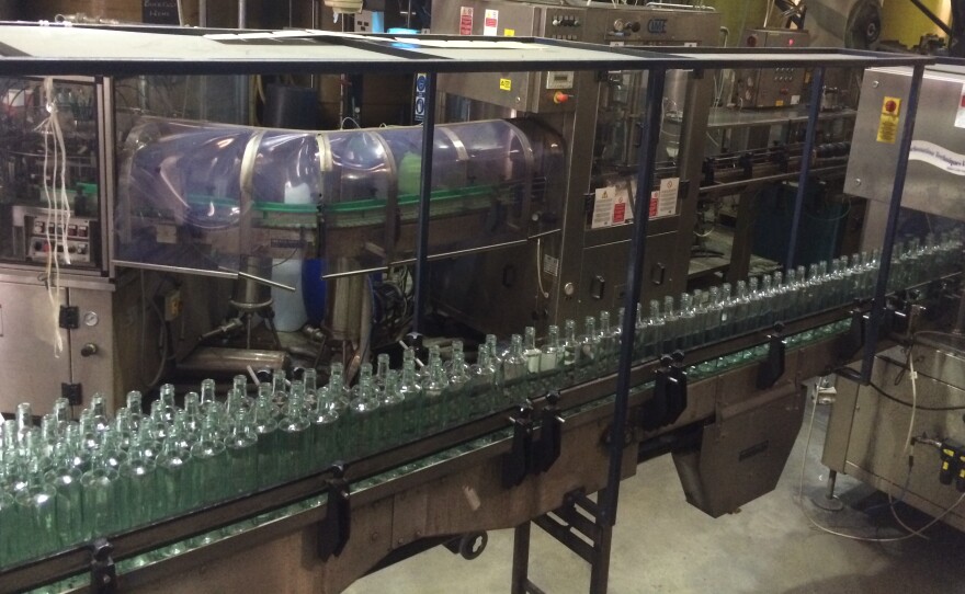 Bottles lined up at the Thames Distillery in London, waiting to be filled.