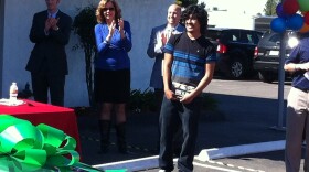 Jorge Palacios beams as he looks gets his first looks at his new car at Caliber Collision in Kearny Mesa, Feb. 22, 2013,