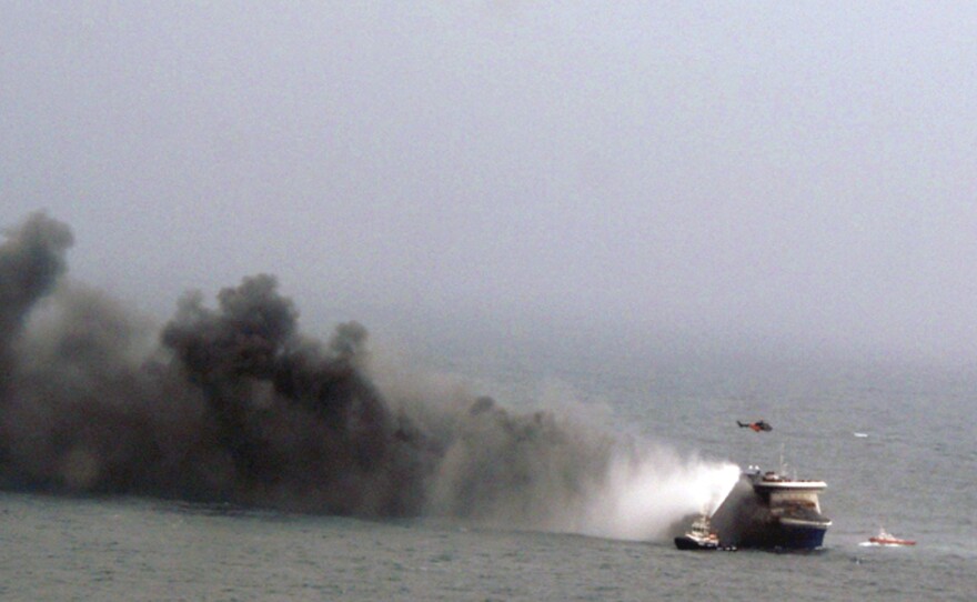 In this image provided by the Italian Navy, smoke billows from the Italian-flagged Norman Atlantic after it caught fire in the Adriatic Sea on Sunday.