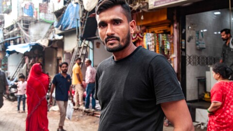 Mohammad Saiyub (above, in a Mumbai quarter on a February day) appeared in a photo that went viral in the early days of the pandemic. He and his childhood buddy Amrit Kumar were hitching home, a journey of nearly 1,000 miles. Kumar, who is a Hindu Dalit, fell ill. Saiyub, a Muslim, cradled his friend by the roadside. Their different religious identities drew attention in a country where communal relations have been polarized after a decade of Hindu nationalist rule. The photo and the story behind it inspired the award-winning movie Homebound.