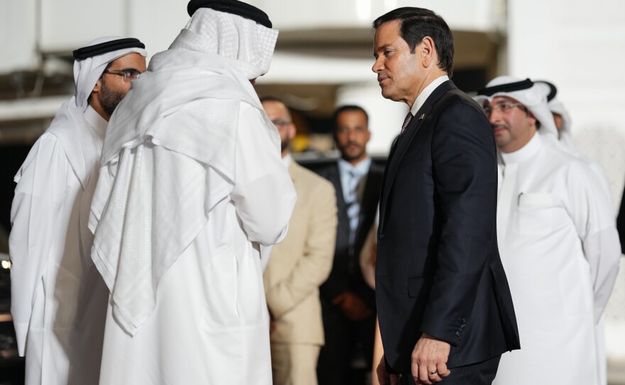 Bahrain's Foreign Minister Abdullatif bin Rashid Al Zayani speaks with U.S. Secretary of State Marco Rubio, right, upon arrival at Bahrain International Airport during his visit to the Middle East to discuss the interim deal between the U.S. and Iran with Arab Gulf allies, in Muharraq, near Manama, Bahrain, Wednesday June 24, 2026.