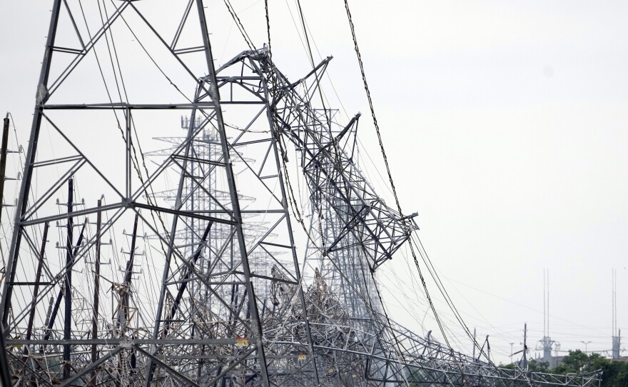 Down power lines are shown in the aftermath of a severe thunderstorm on Friday, near Houston.