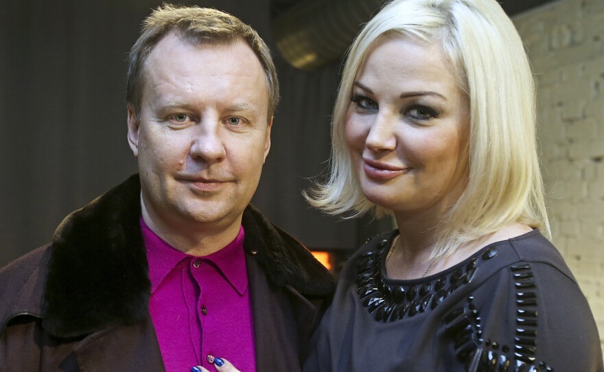 Denis Voronenkov was shot in the head on a sidewalk in Ukraine's capital city, Kiev, on Thursday. He's seen here with his wife, Maria Maksakova, in February.