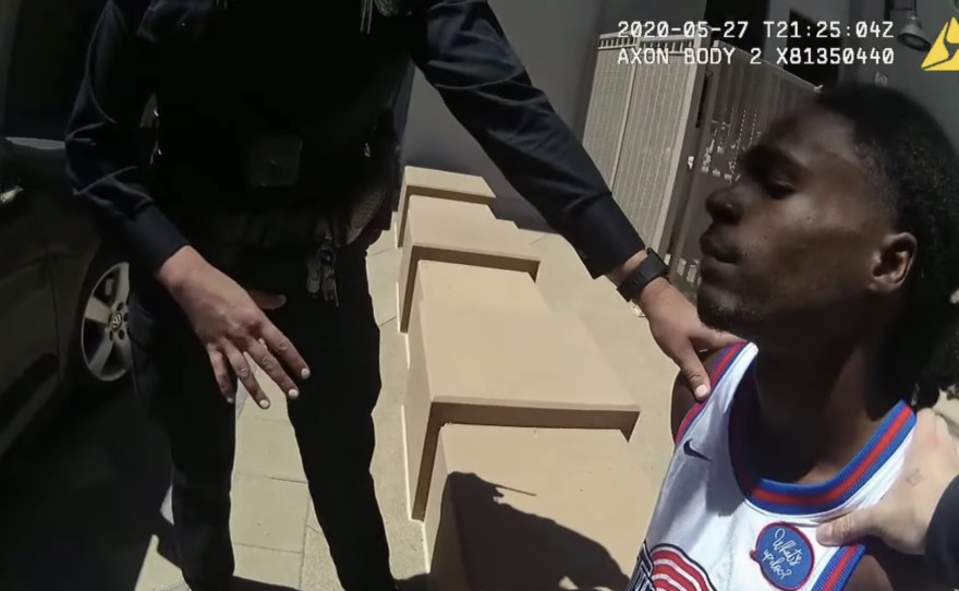 In body cam footage released by La Mesa Police Department, officers hold down 23-year-old Amaurie Johnson during his arrest near the Grossmont Trolley Station, May 27, 2020.