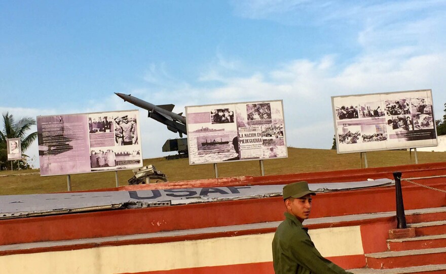 The remnants of a wrecked U.S. spy plane on display next to a surface-to-air missile like those used during the 1962 Cuban Missile Crisis in Havana.