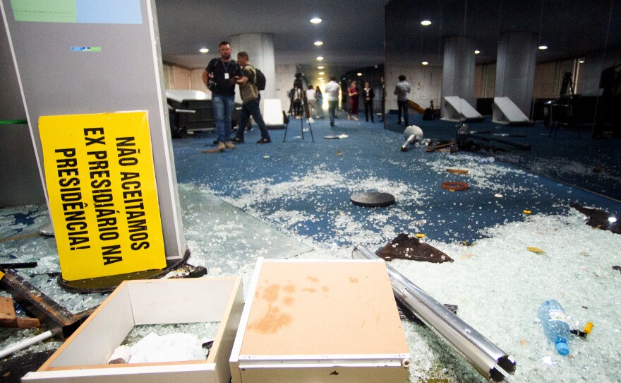 Damage is seen at Brazil's Congress one day after supporters of former President Jair Bolsonaro stormed government buildings in Brasília. The attack was planned by far-right groups on social media, according to Brazilian media and analysts.