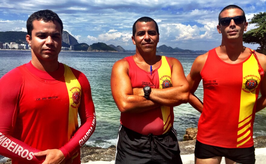 Rio lifeguards Gustavo Melich (from left), Commander Fernando Santos and Maj. Felipe Puell on Copacabana Beach. The lifeguards say they are always busy, but never more so than on New Year's Eve.