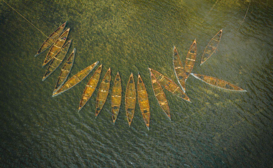 Camp Widjiwagan submerged some of their canoes in lake waters to protect them from the wildfires.