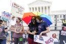 Abortion-rights activists react outside the Supreme Court in Washington, Friday, June 24, 2022. The Supreme Court has ended constitutional protections for abortion that had been in place nearly 50 years in a decision by its conservative majority to overturn Roe v. Wade.