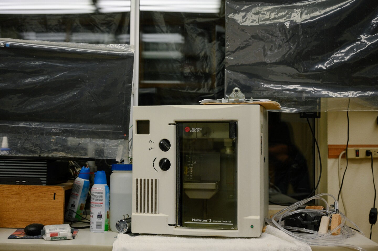 A particle counter, which Imperial Irrigation District hatchery workers use to test whether grass carp have been sterilized, sits on a desk at IID's grass carp hatchery in El Centro in Imperial County on May 7, 2024.