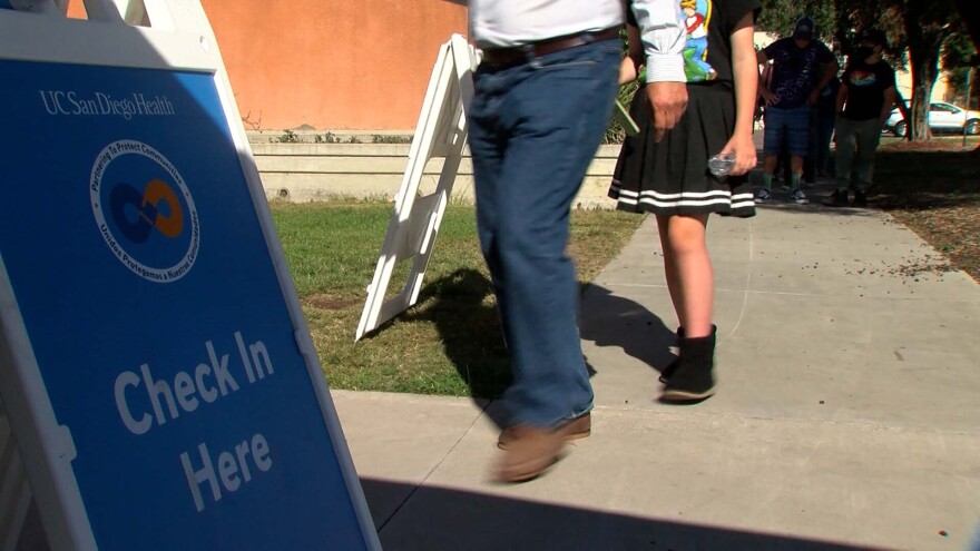 Parents and children line up for COVID vaccinations, San Diego Unified Education Center, November 12, 2021