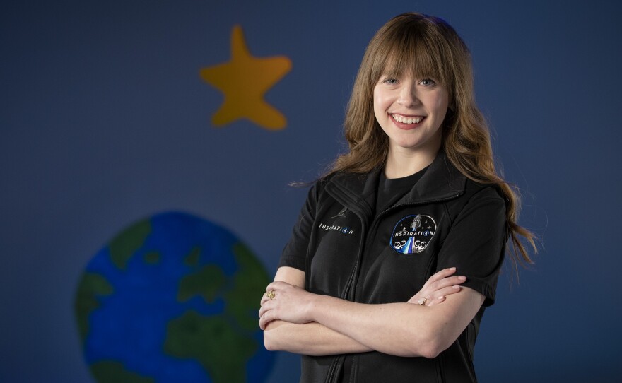 A photo provided by St. Jude Children's Research Hospital shows Hayley Arceneaux at the hospital in Memphis, Tenn. It announced on Monday that Arceneaux, a former patient and current employee, will be one of four crew members on the first all-civilian space flight this year.