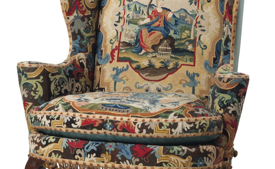 The George I Walnut and Beech Wing Armchair, circa 1725, covered in 18th century gros point and petit point needlework, is one of Huguette Clark's many belongings headed to auction.