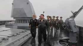 In this photo provided on May 8, 2026, by the North Korean government, its leader Kim Jong Un, center, visits the destroyer Choe Hyon to review its maneuverability off North Korea's west coast, Thursday, May 7, 2026. Independent journalists were not given access to cover the event depicted in this image distributed by the North Korean government. The content of this image is as provided and cannot be independently verified. Korean language watermark on image as provided by source reads: "KCNA" which is the abbreviation for Korean Central News Agency.