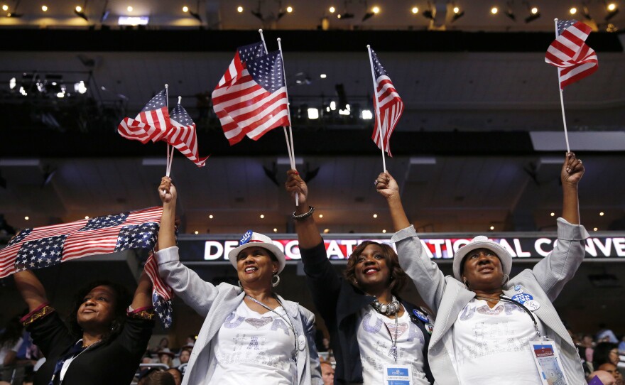 Alabama delegates cheer during the convention on Thursday.