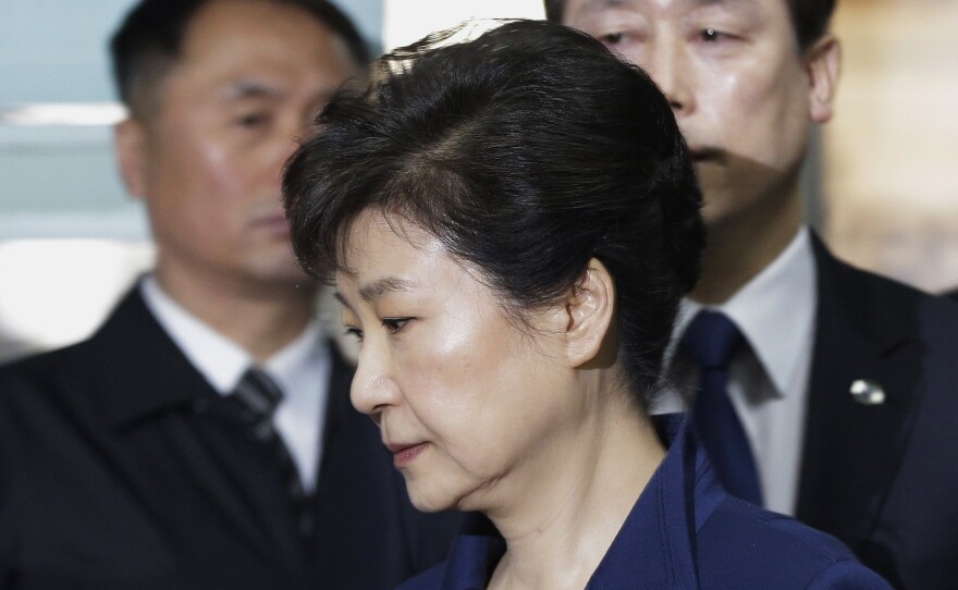 Ousted South Korean President Park Geun-hye arrives at the Seoul Central District Court for a hearing in late March. Arrested shortly after that hearing, Park has now been formally indicted on corruption charges.