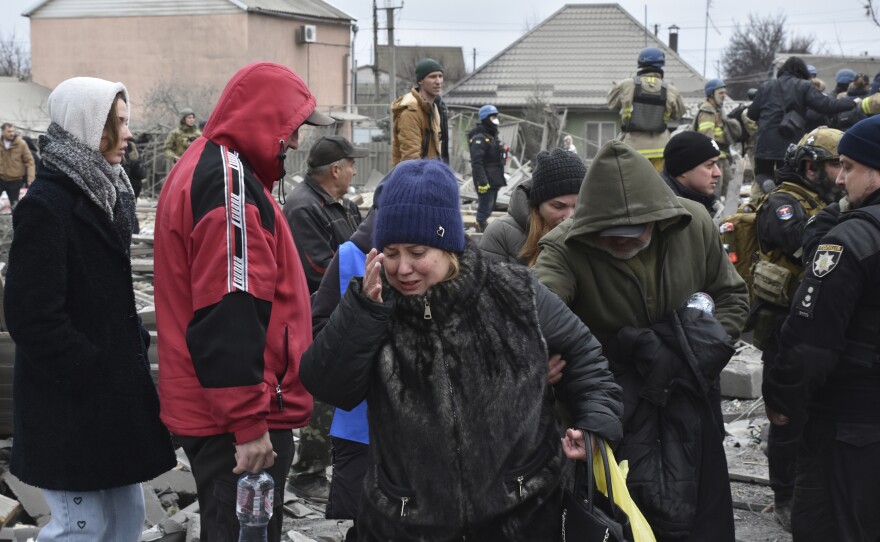 Zaporizhzhia: People react after Russia's massive air attack damaged their homes.