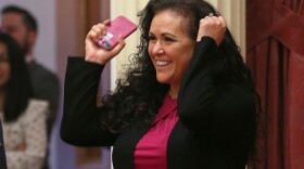 In this Aug. 22, 2018, photo, Assemblywoman Lorena Gonzalez Fletcher, D-San Diego, celebrates as the state Senate approves her forced arbitration bill in Sacramento, Calif. 