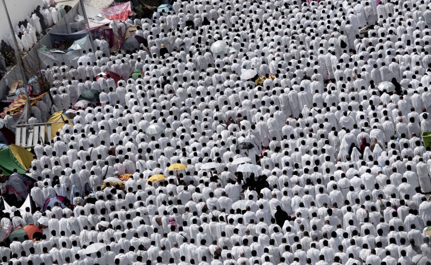 Hundreds of thousands of Muslim pilgrims pray outside Namira Mosque in Arafat, on the second and most significant day of the annual hajj pilgrimage.