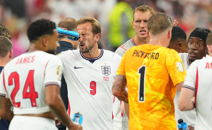 England's Harry Kane (9) cools off during a hydration break of the World Cup Group L soccer match between England and Croatia in Arlington, Texas, near Dallas, Wednesday, June 17, 2026.