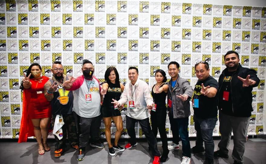 Patricio Ginelsa (center) with the "Lumpia with a Vengeance" team at Comic-Con Special Edition. Nov. 26, 2021