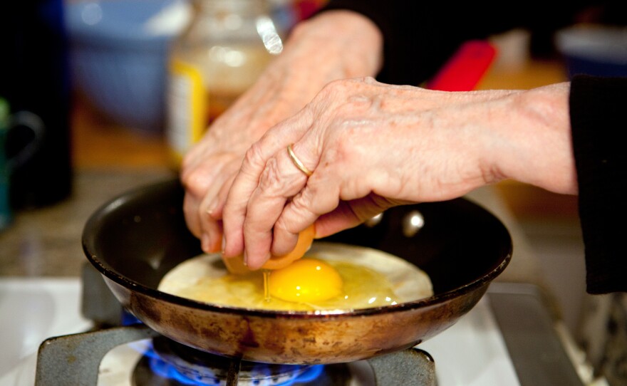 When the yolk is almost pink, you take it out of the skillet.