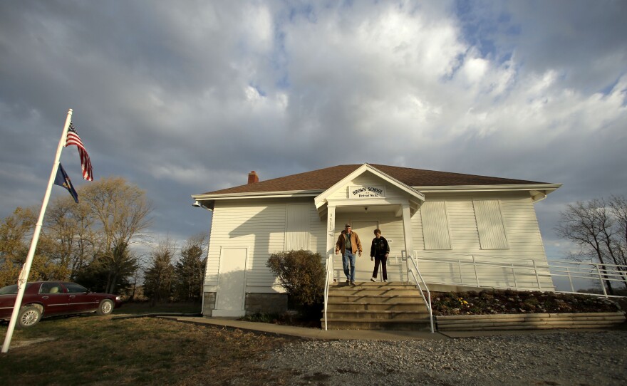 Karl and Twilla Eisele, of Wellsville, Kan., leave the old Brown School after voting on Nov. 6, 2012, in rural Wellsville, Kan. Recent elections have made the Kansas Legislature the most conservative in the state's history.