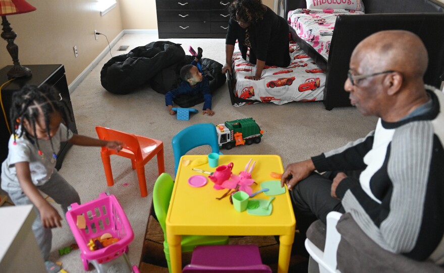Wilma Walker and her husband, Howard, enjoy playtime with their grandchildren. "With all of us in the same home, I feel like I'm the one that's kind of guarding everybody," Wilma says.