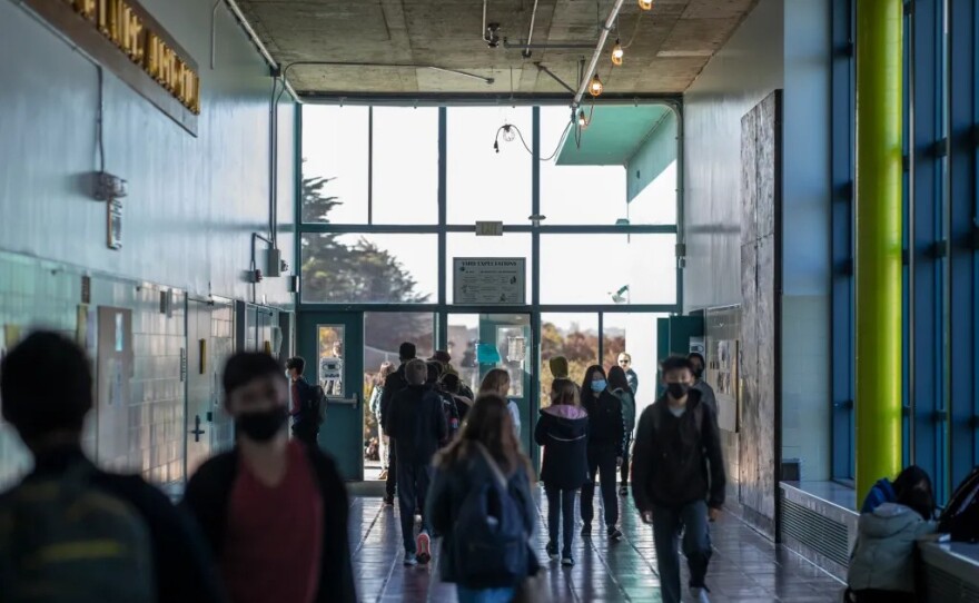 Students walk the hallways at AP Gianni Middle School in San Francisco on April 22, 2022. San Francisco Unified School District — which got more than $186 million in federal stimulus funds — faced criticism for being slow to reopen in-person instruction during the pandemic. Officials refused to release records showing how they spent stimulus money.