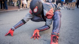 Dressed as Miles Morales, Nicholas Prior poses for a portrait outside Comic-Con on July 25, 2025.