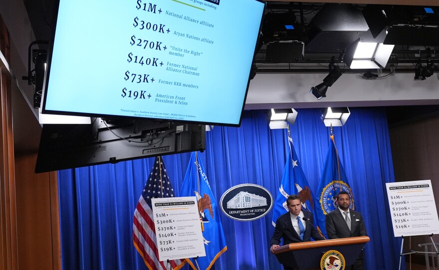Acting Attorney General Todd Blanche speaks as FBI Director Kash Patel listens during a news conference at the Justice Department on Tuesday in Washington.