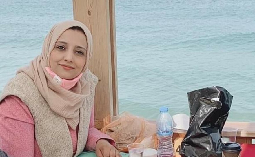 Eman Abusaeid in an undated photo near Gaza's coast. She struggled to keep her two children safe in the Gaza Strip, as Israeli bombs pounded her neighborhood in the days after Oct. 7, when Hamas militants attacked Israel.