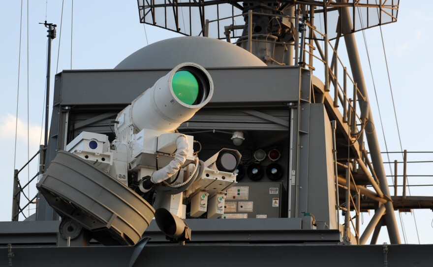 A laser weapon system on the USS Ponce has been deployed to the Arabian Gulf. The Navy released a video showing the system taking target practice.