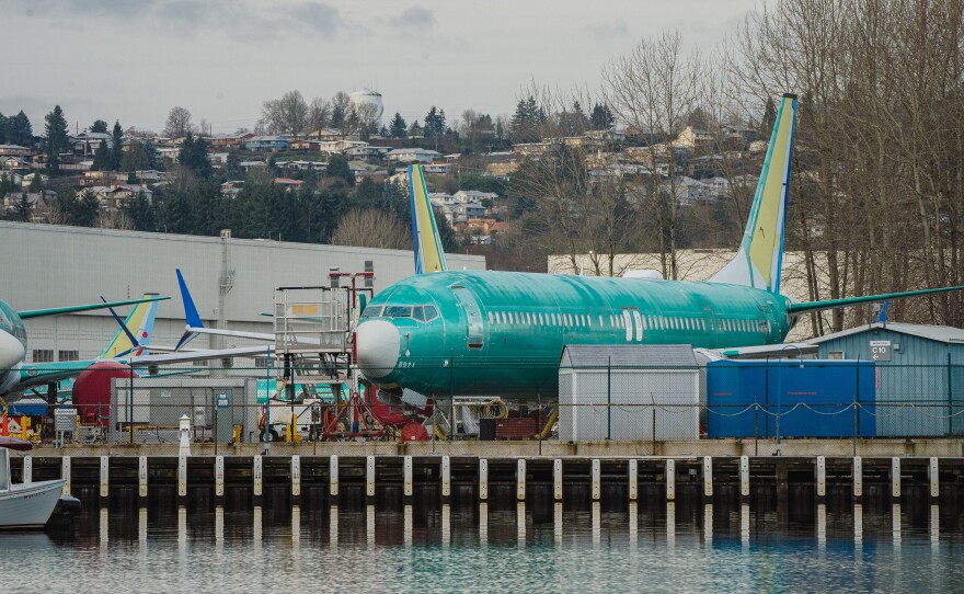 Boeing is under heightened scrutiny from regulators and the public after a door plug panel blew off a jet in midair two months ago. Now the Justice Department is conducting a criminal investigation. Several Boeing 737 Max planes under construction in Renton, Wash. are shown outside the company's plant on February 27, 2024.